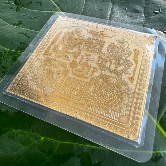 Ganesha- og Lakshmi-yantra-design, der symboliserer nye begyndelser, fjernelse af forhindringer og overflod