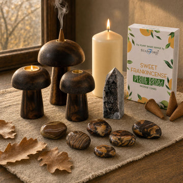 The Turning Table: Autumn decor for the table: wooden mushroom incense holders, an ivory pillar, calcite and picture jasper