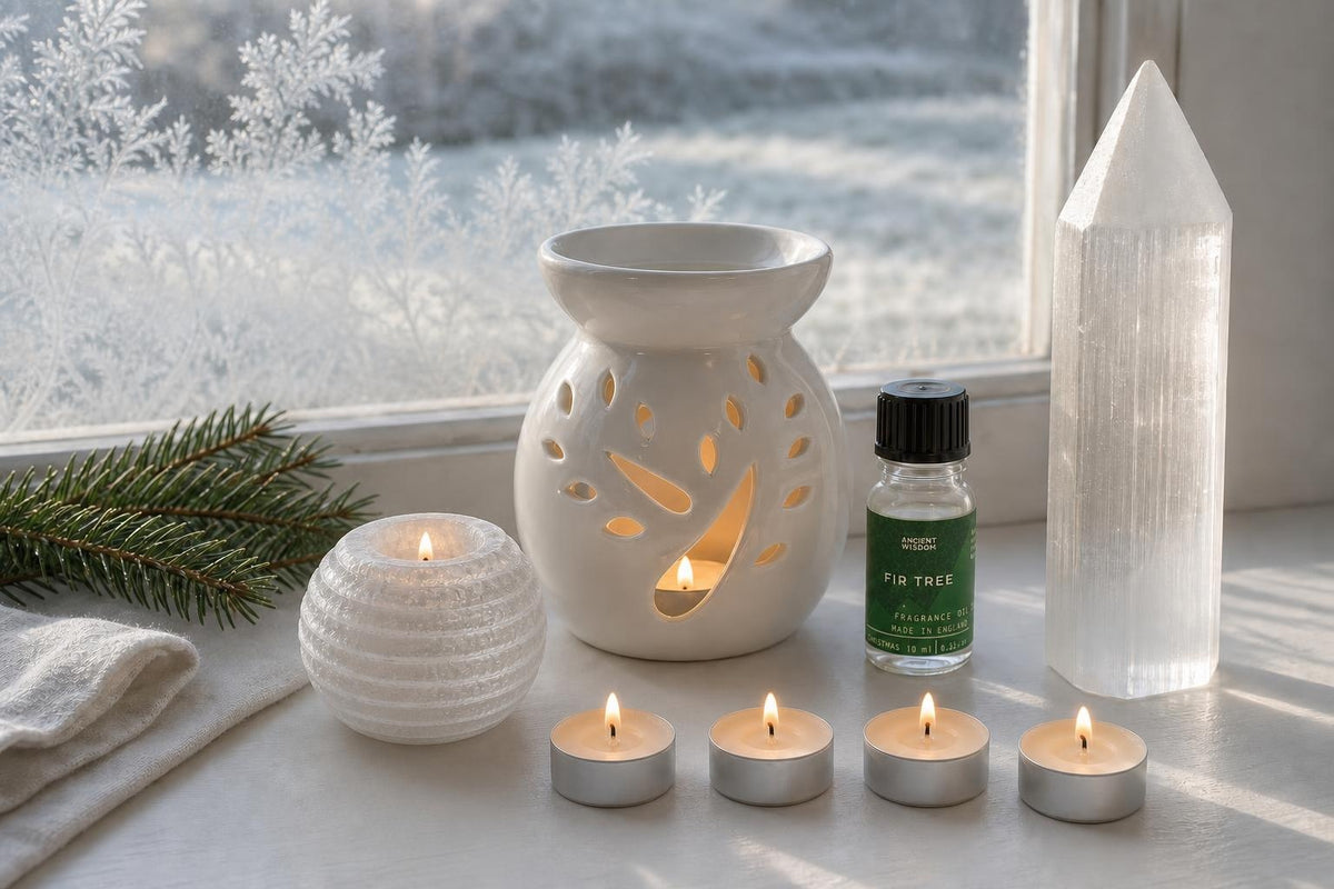First Frost: A winter candle set in white: a selenite snowball tealight holder, a white tree burner, fir oil and a selenite point