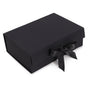Black gift box with a black ribbon on a white background