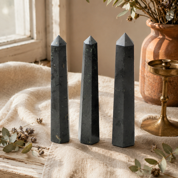 Gemstone Six Face Obelisk Point approx 11cm - Black Tourmaline — styled in a warm, naturally lit interior
