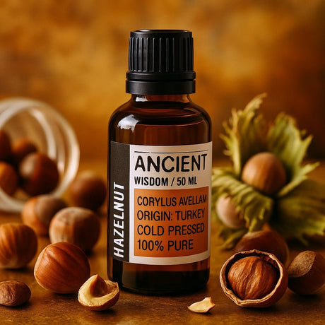 Bottle of Ancient Wisdom hazelnut oil with hazelnuts on a wooden surface