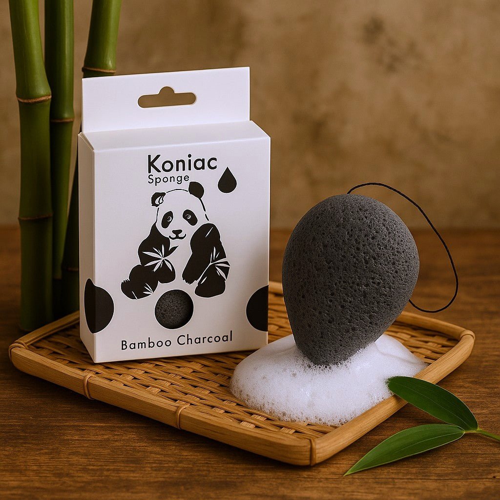 Koniac Bamboo Charcoal sponge with packaging on a wooden tray