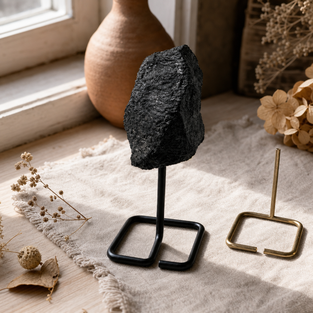 Mineral Specimen on Metal Stand - Black Tourmaline — styled in a warm, naturally lit interior