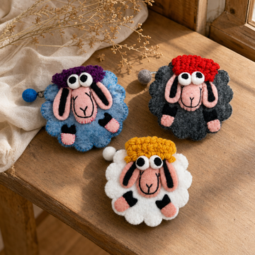 Natural Felt Zipper Pouches - Fresh Colours Happy Sheep — styled in a warm, naturally lit interior