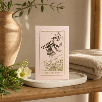 Pink Box Ruby Foil Tarot Card Gift Box Set - with booklet — styled in a warm, naturally lit interior