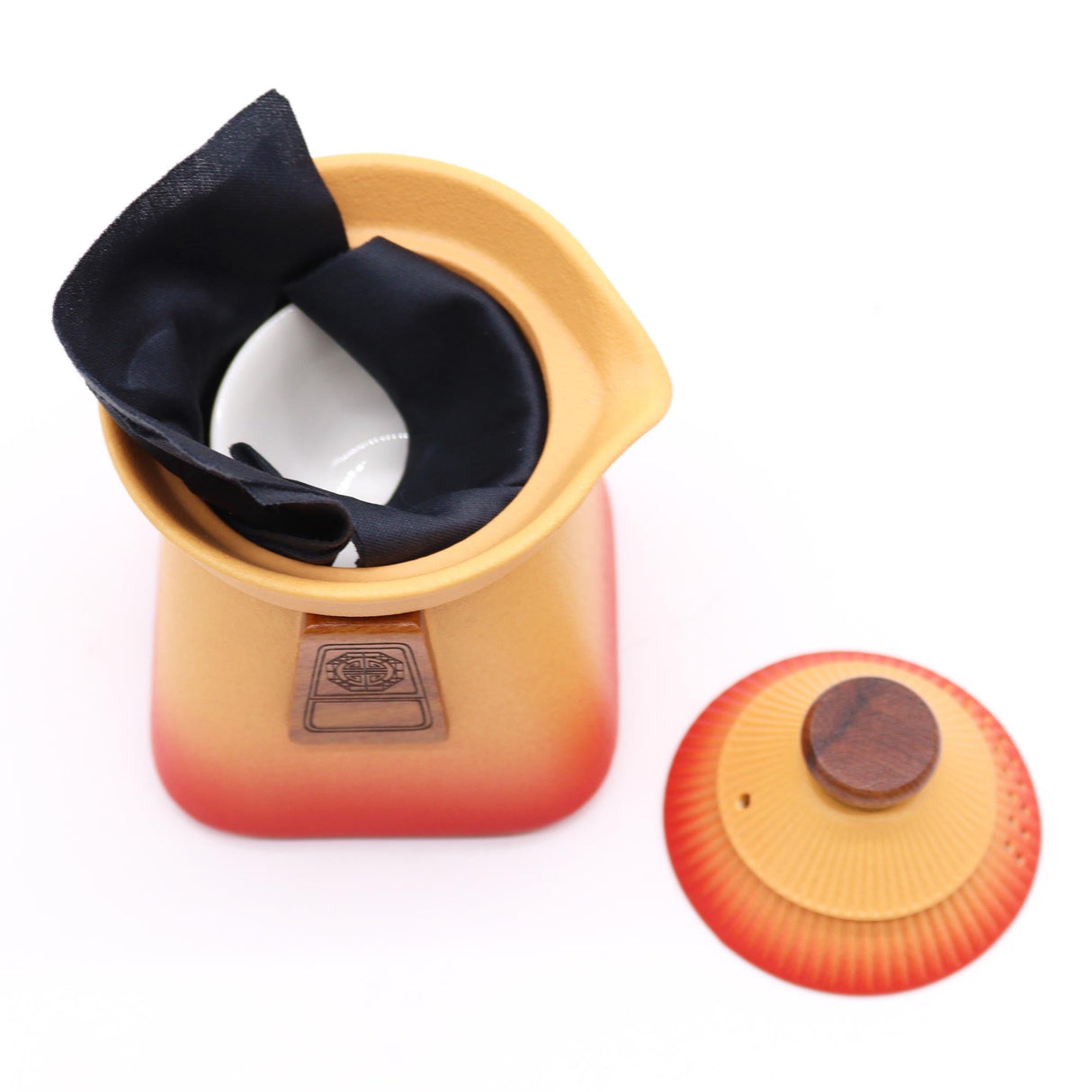 Tea pot with a lid on a white background