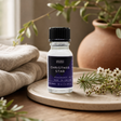 10ml Christmas Star Fragrance Oil — styled in a warm, naturally lit interior