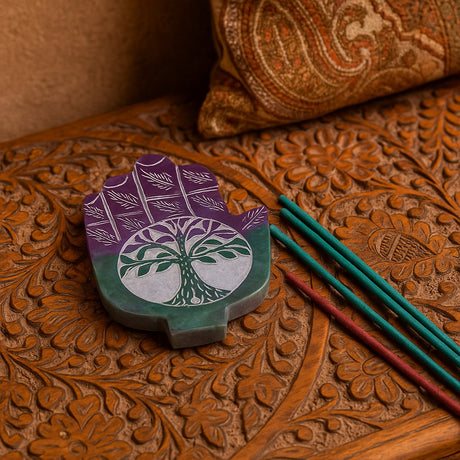 Decorative item with tree design on a wooden surface