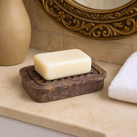 Bar of soap on a brown soap dish with decorative mirror in the background