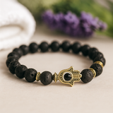 Pulsera de cuentas de piedra de lava con cristal de Hamsa dorado