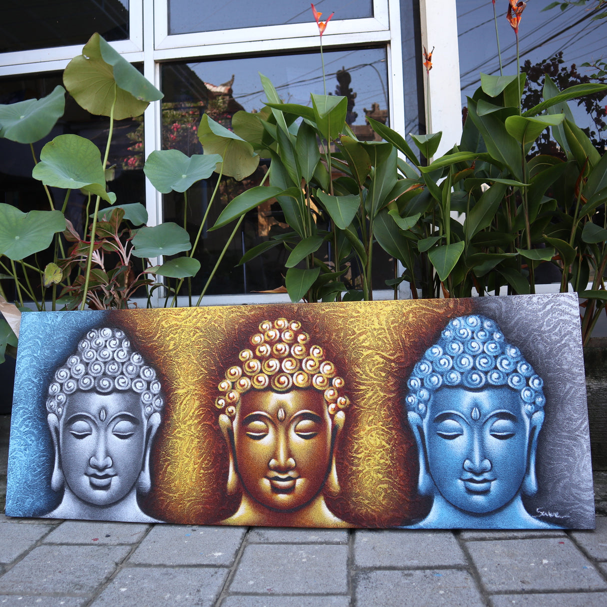Buddha kangas-taideteos, kolme päät kultaiset yksityiskohdat