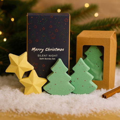 Christmas-themed bath bombs with packaging on a snowy surface with festive background