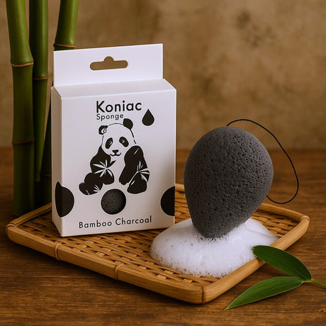Koniac Bamboo Charcoal sponge with packaging on a wooden tray