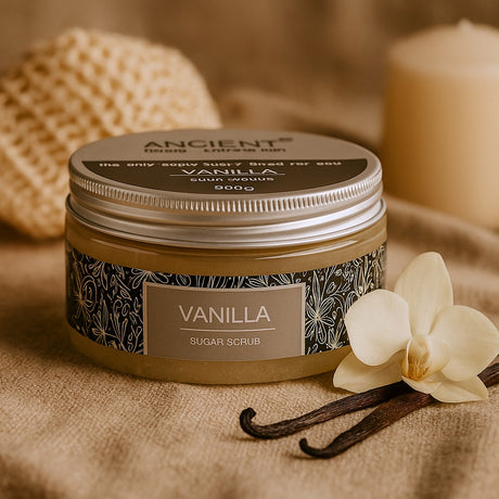 Jar of Vanilla Sugar Scrub with Vanilla Beans and Flower on a Textured Surface