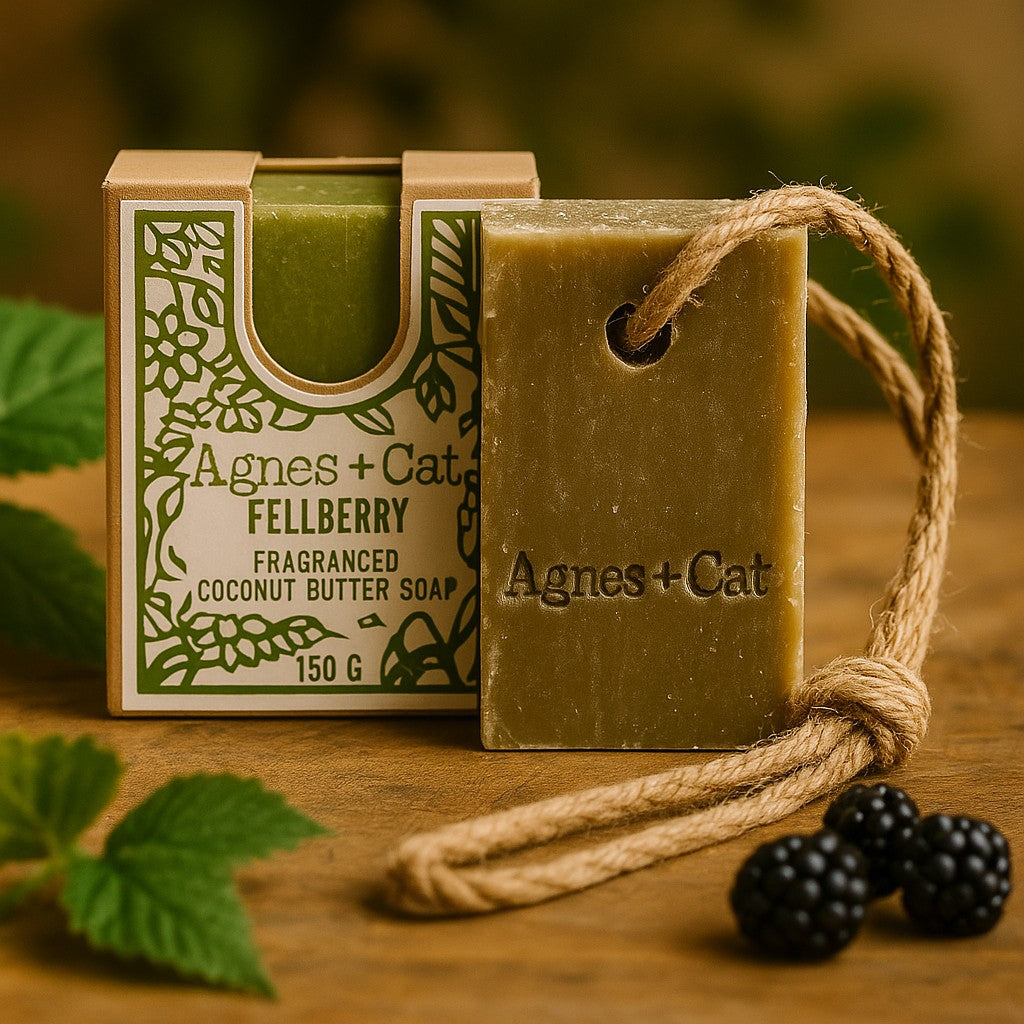 Agnes + Cat Fellberry soap with packaging on a wooden surface