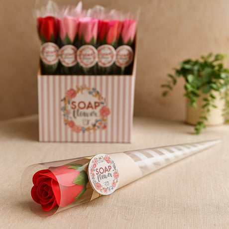 Bouquet of soap flowers with packaging on a beige surface