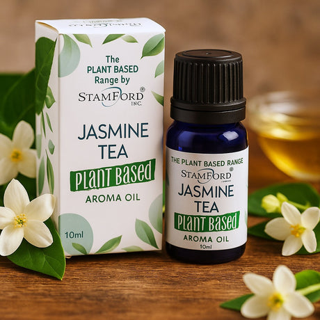 Stamford Jasmine Tea aroma oil bottle and packaging on a wooden surface with flowers.