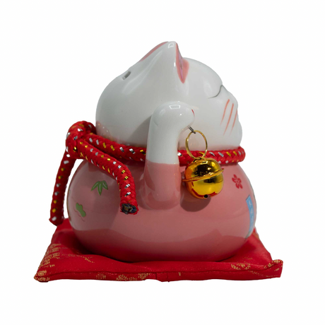 Керамическая копилка Кошка с деньгами – розовая на подушке