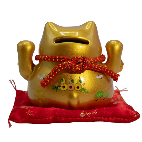 Керамическая копилка Кошка с деньгами – золотая на подушке