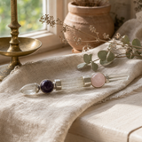 Axis of Grace Wand - Amethyst & Rose Quartz Spheres, Quartz Stem - 12cm — styled in a warm, naturally lit interior