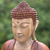 Statua di Buddha intagliata a mano in legno di Suar 60cm