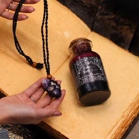 Forntida häxbadsspellotion & citrinkristallamulet – Framgång