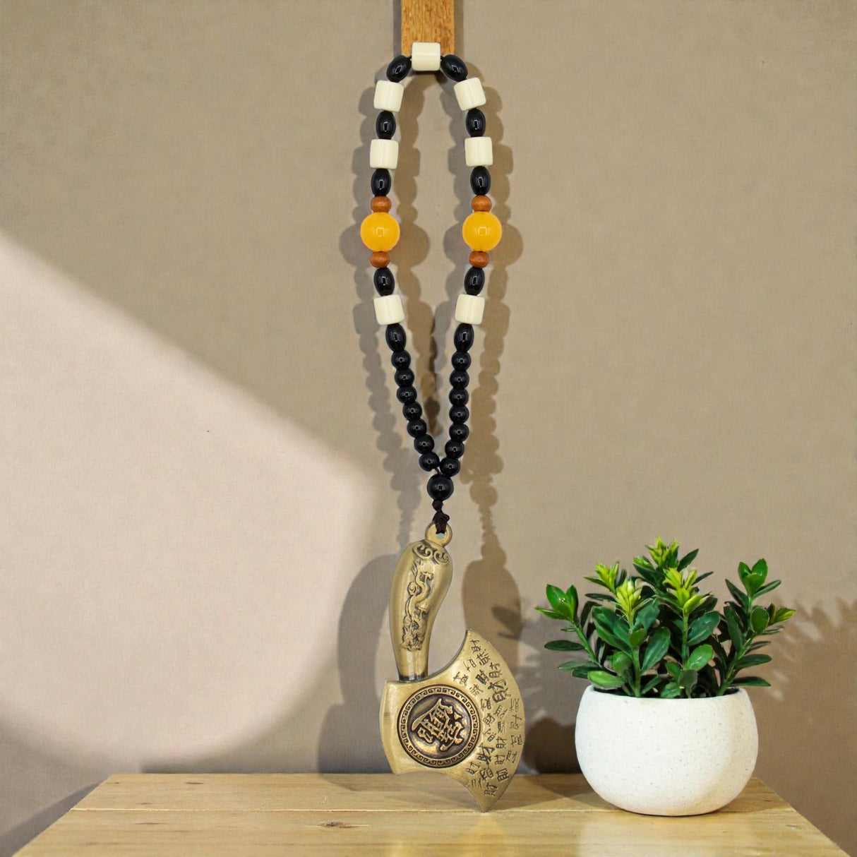 Feng Shui Hanging – Axe Away Obstacles