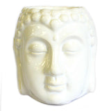 White ceramic Buddha head oil burner with serene expression and glossy finish