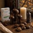 The Turning Table: Autumn decor for the table: wooden mushroom incense holders, an ivory pillar, calcite and picture jasper