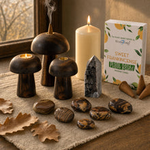 The Turning Table: Autumn decor for the table: wooden mushroom incense holders, an ivory pillar, calcite and picture jasper