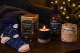 The Night Before: A Christmas Eve box for grown-ups: a brandy-butter candle, spiced tea, bamboo socks, a pillow spray and gingerbread whipped soap