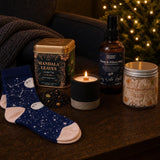 The Night Before: A Christmas Eve box for grown-ups: a brandy-butter candle, spiced tea, bamboo socks, a pillow spray and gingerbread whipped soap