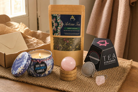 For a Hard Week: A thinking-of-you gift: a rose quartz sphere, a tea and rose tin candle, green tea with mint and rose, and a tea infuser