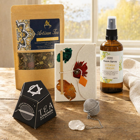 The First Hour: A morning routine set: a pressed-flower notebook, green and white tea, a quartz tea strainer and a citrus room spray