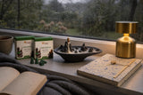 Rain and a Long Book: A gift for book lovers: a mountain backflow burner, patchouli cones, a lokta notebook and a small reading lamp