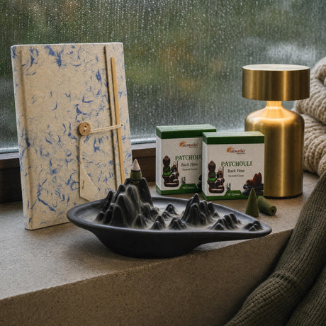 Rain and a Long Book: A gift for book lovers: a mountain backflow burner, patchouli cones, a lokta notebook and a small reading lamp