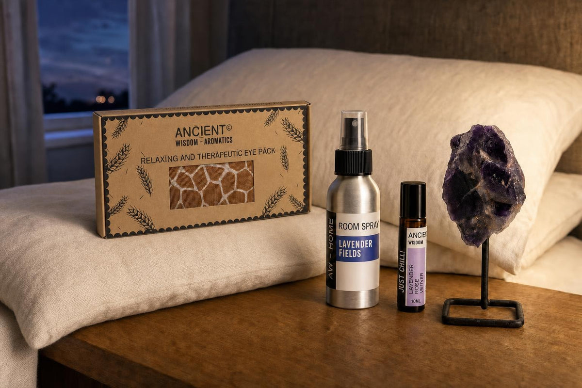 The Last Light Out: A sleep gift set for bedtime: a wheat and lavender eye pillow, a lavender room spray, a lavender, rose and vetiver roll-on and an amethyst on a stand