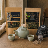 Two Cups, One Pot: A tea gift set: a jade ceramic teapot with two cups, two loose-leaf tea blends and a smoky quartz tea strainer