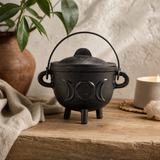 Cast Iron Cauldron with Triple Moon 11 × 13 cm — styled in a warm, naturally lit interior