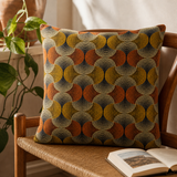 Classic Cushion Cover - Urban Swirl - 60 × 60 cm - Jumbo Style — styled in a warm, naturally lit interior