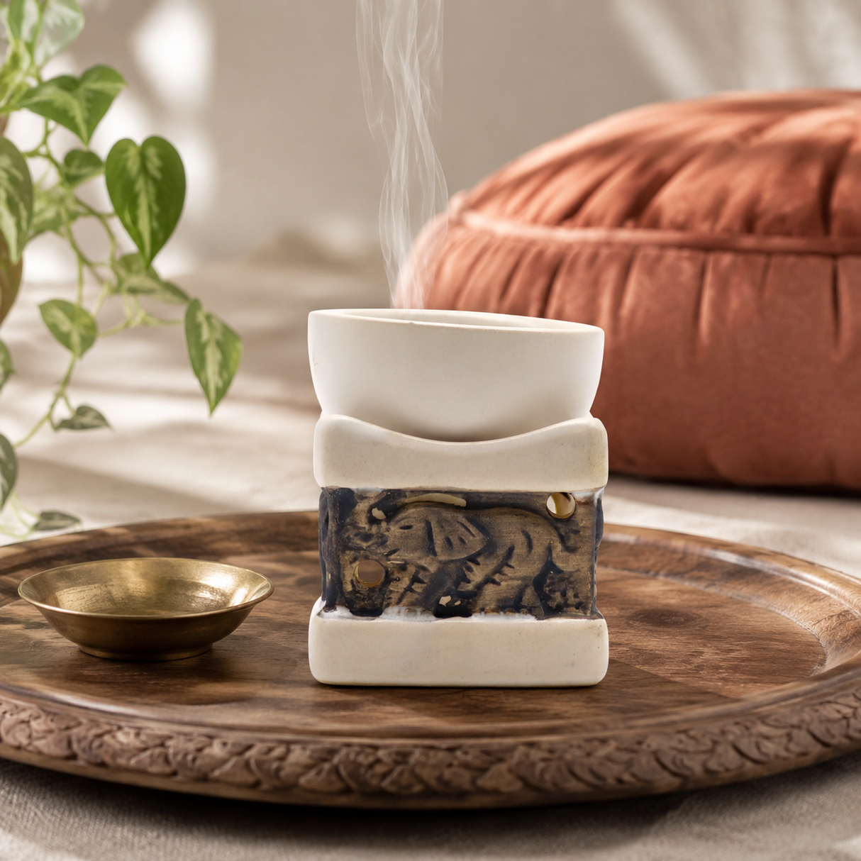 Classic Elephant Oil Burners — styled in a warm, naturally lit interior
