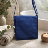 Cotton Canvas Messenger Bag - Navy Blue — styled in a warm, naturally lit interior