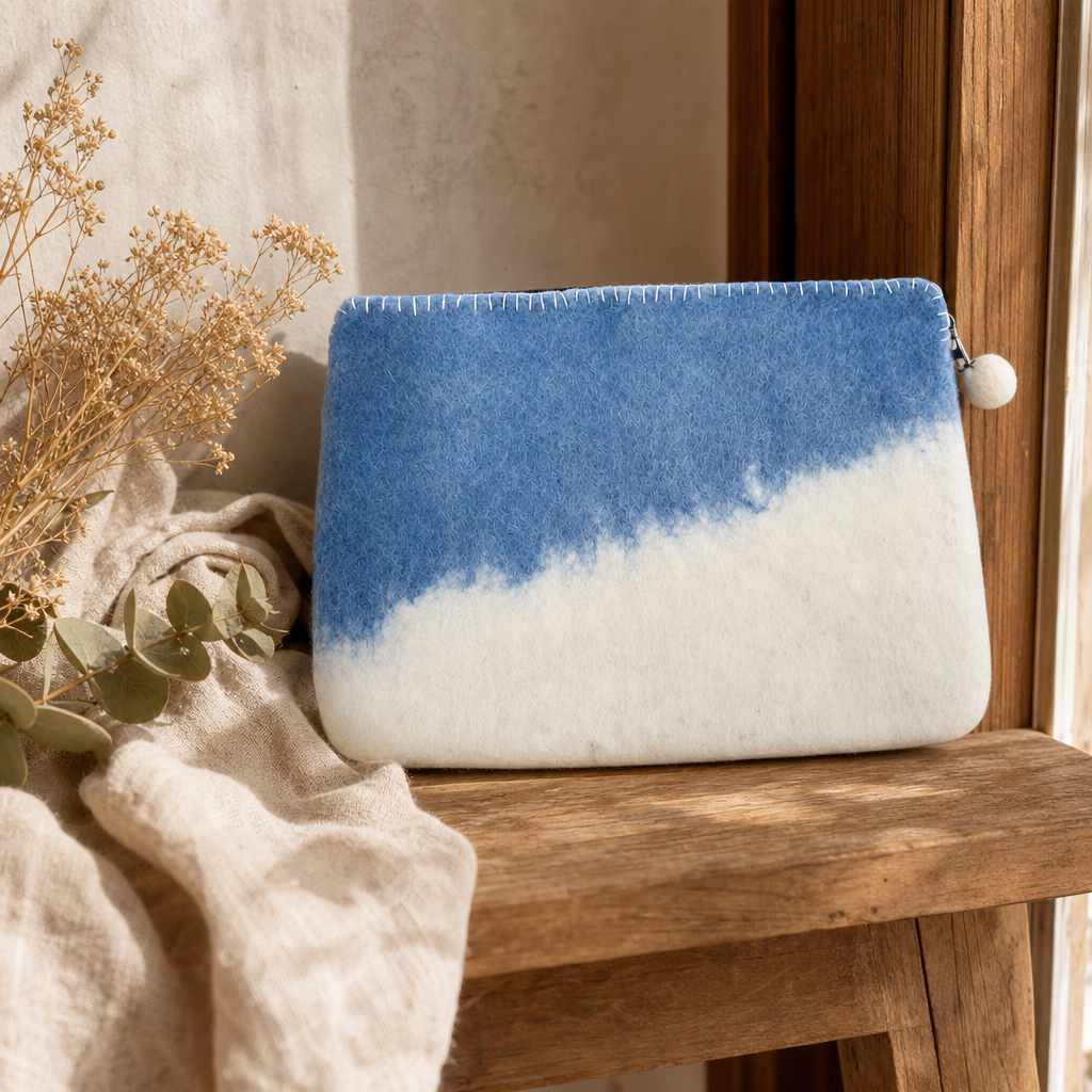 Felt Laptop Pouch (up to 14") - Blue Horizon — styled in a warm, naturally lit interior