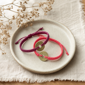 Handmade Friendship Bracelets - Lucky Friends Feng Shui Coin — styled in a warm, naturally lit interior