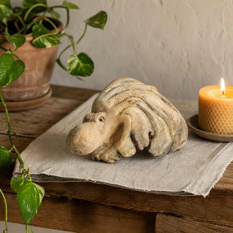 Handmade Parasite Wood Art Carving - Ocean Guarding Octopus — styled in a warm, naturally lit interior