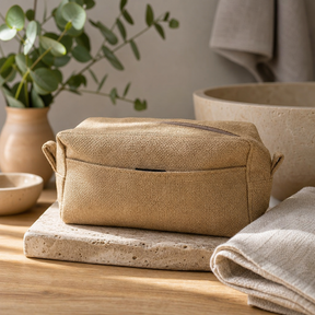 Jute Toiletry Bag - Natural — styled in a warm, naturally lit interior