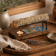 Large Sage Stick Heater Enamelled - The Star — styled in a warm, naturally lit interior