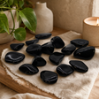 M Tumble Stone - Obsidian Black — styled in a warm, naturally lit interior
