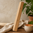 Manglid Wood Healing Rainstick - 60cm (9 minutes) — styled in a warm, naturally lit interior